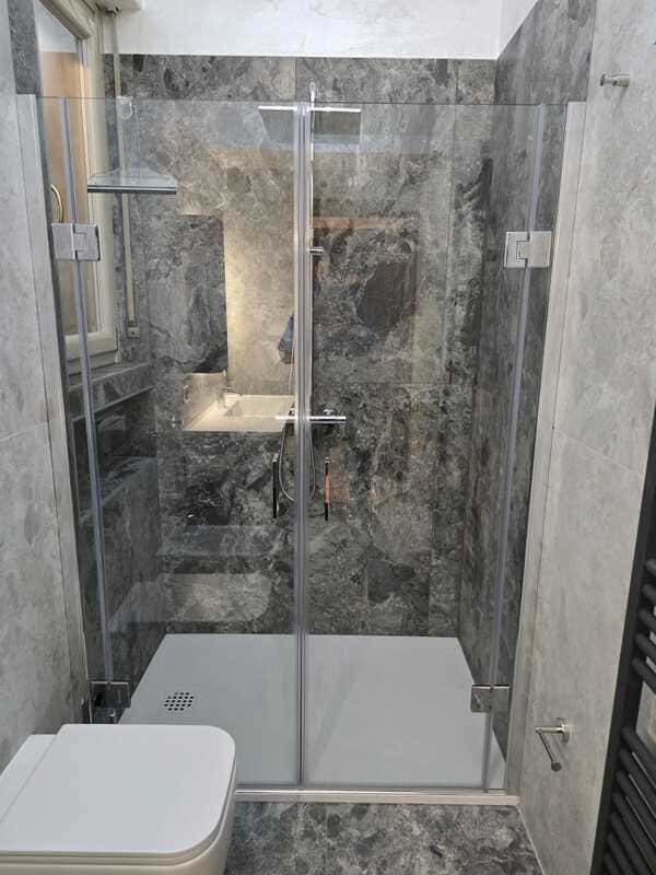 Porta doppia battente per doccia apertura saloon 140 cm